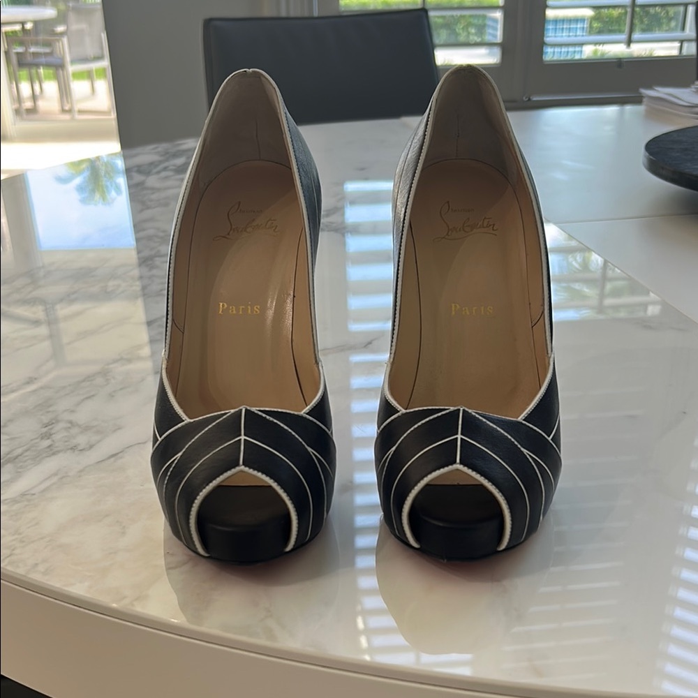 Christian Louboutin Black and White Heels with Elegant Design